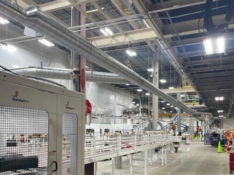 Dust Collection System hung from ceiling for Tissue Converting Line Project