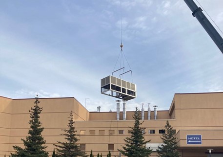 Chiller being carried by a Crane at Kewadin Casinos